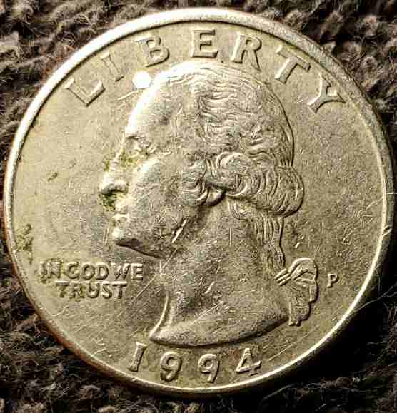 1994-P-Quarter...strikethru-With-A-Hologram-On-Both-Sides